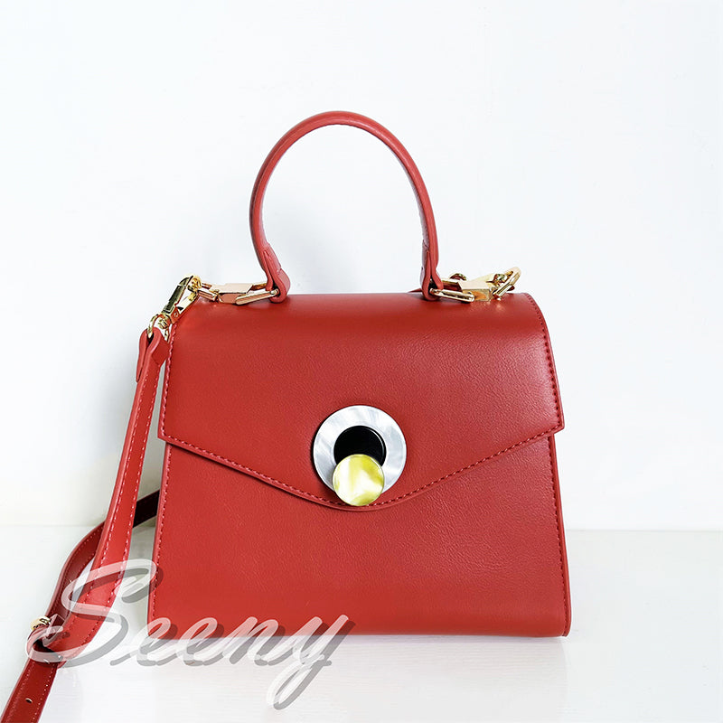 RUIWEI turn lock handbag 44996  Cowhide bag niche design handbag new high-end texture bag