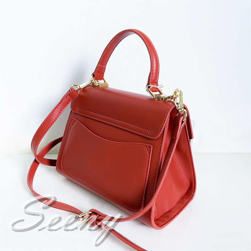 RUIWEI turn lock handbag 44996  Cowhide bag niche design handbag new high-end texture bag